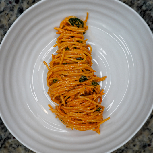 Plate of pasta in a red sauce