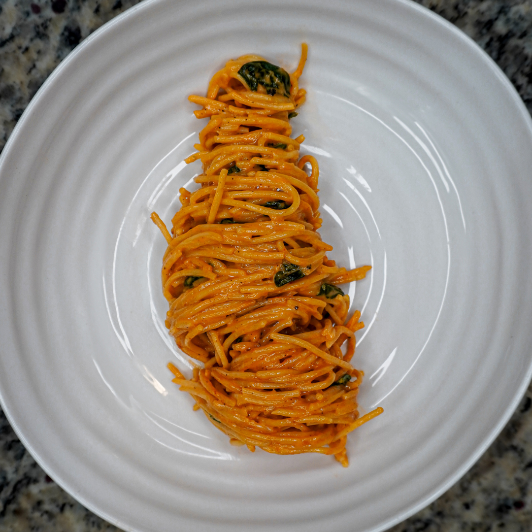 Plate of pasta in a red sauce