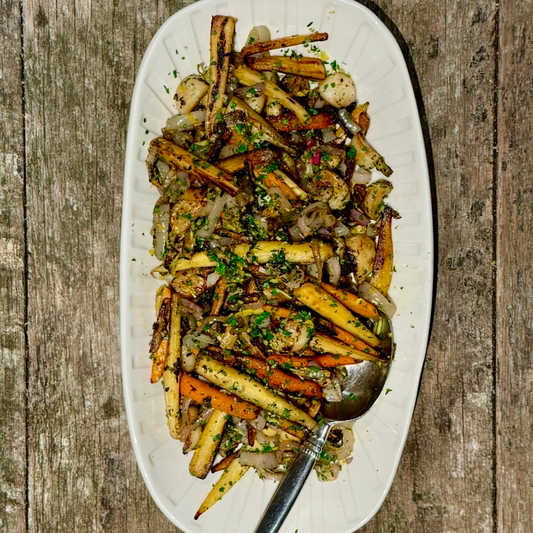 cooked root vegetables on white serving dish